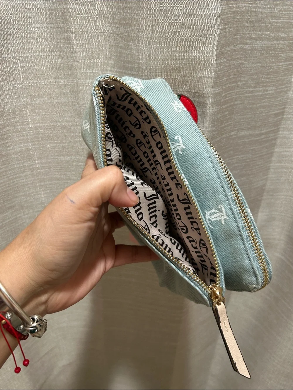 Juicy Couture Light Blue Monogram Cosmetic Wristlet with Strawberry Charm